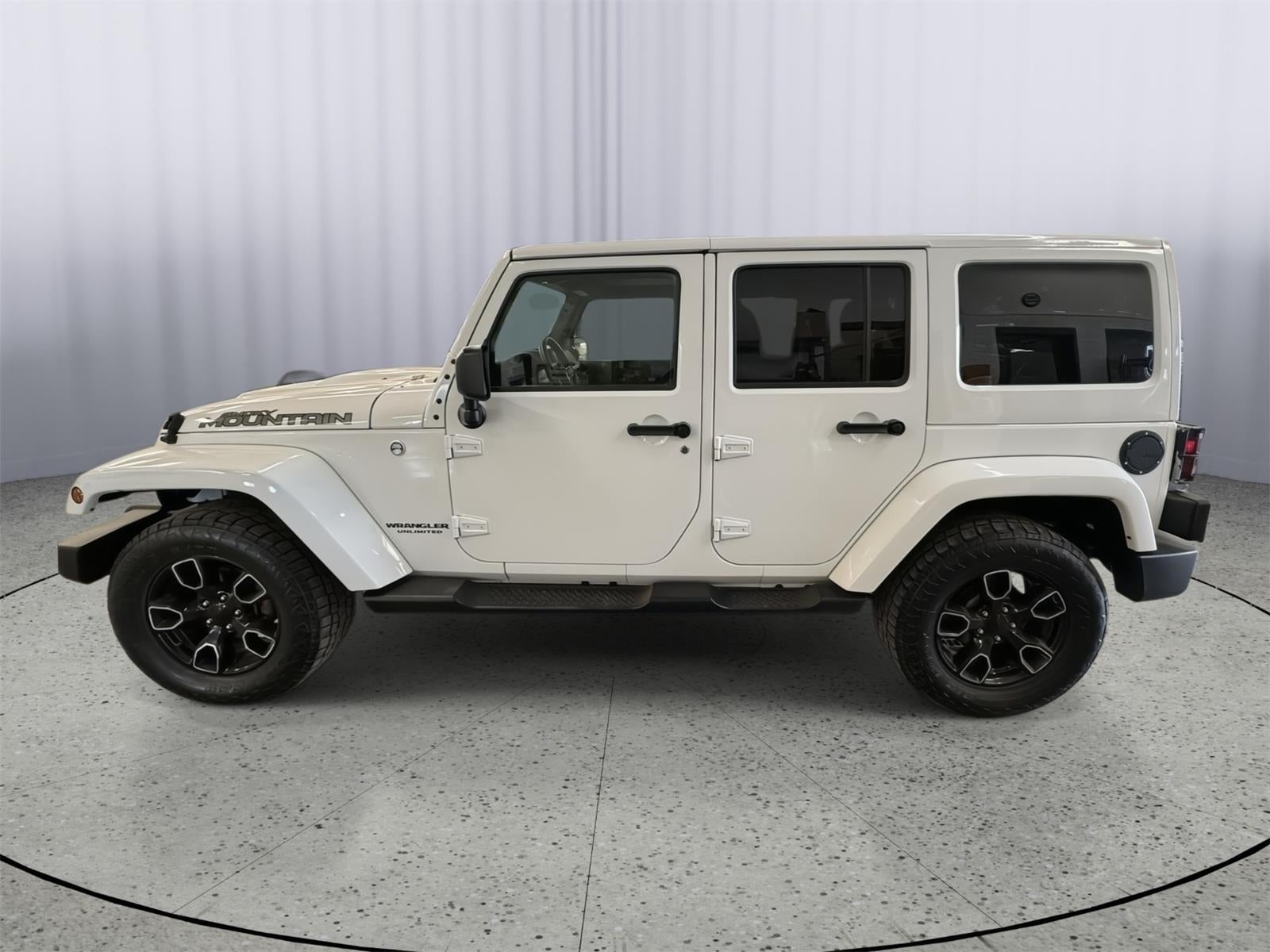 Used 2017 Jeep Wrangler Unlimited Smoky Mountain with VIN 1C4BJWEG9HL670607 for sale in Kansas City