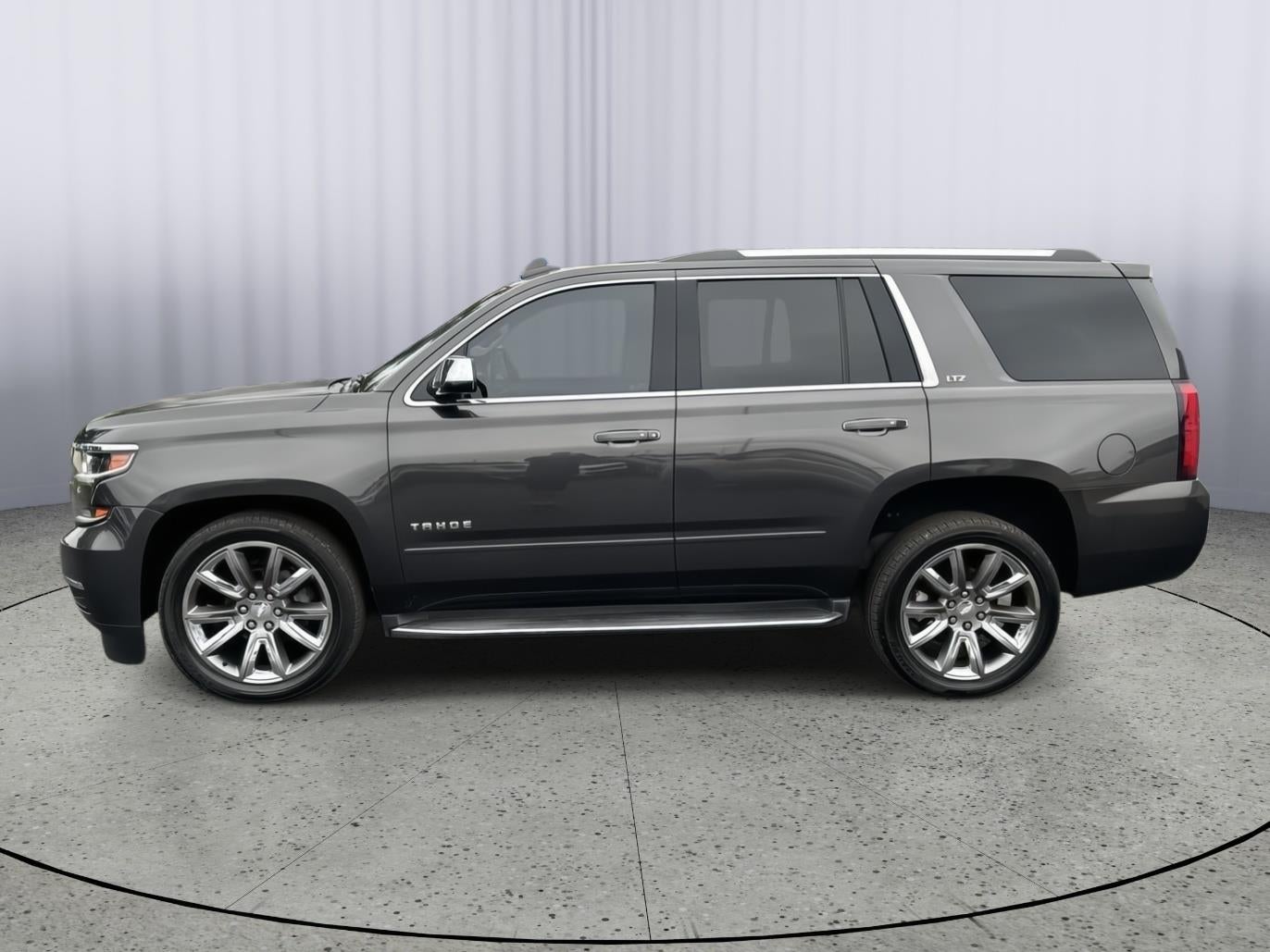 Used 2016 Chevrolet Tahoe LTZ with VIN 1GNSKCKC4GR125611 for sale in Topeka, KS