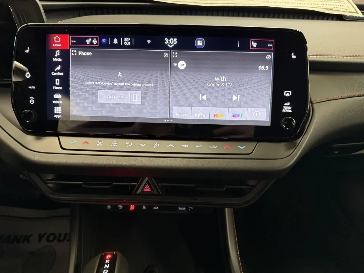 The center touchscreen showing the audio display.
