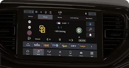 Uconnect touchscreen showing SiriusXM channel listings