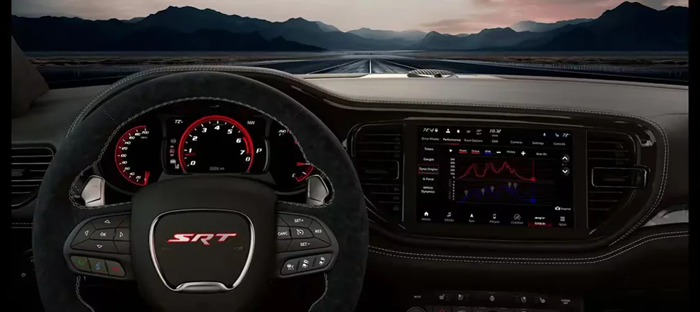 Dodge Durango SRT cockpit showing the cluster and Uconnect touchscreen
