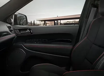 Dodge Durango front seats and door trim with red accent stitching