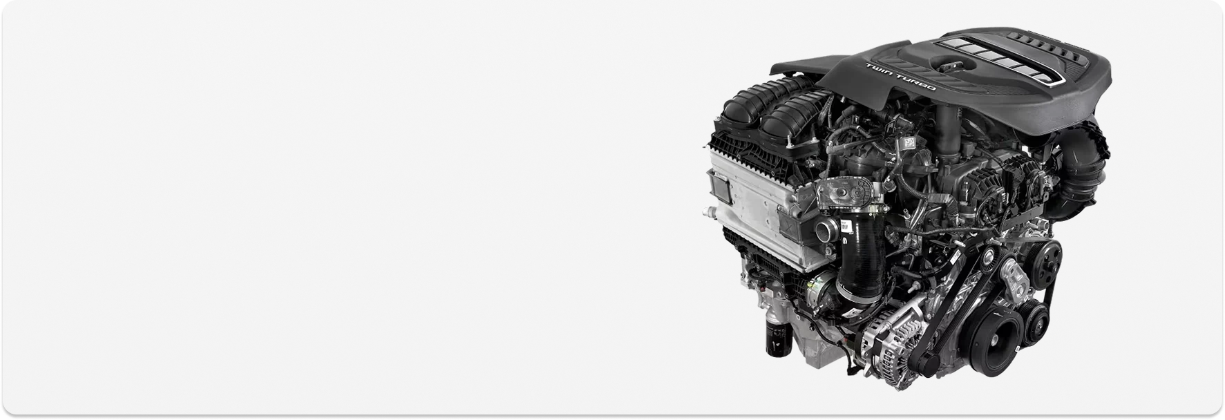 High-output 3.0L Hurricane twin-turbo inline-six engine on a dark background