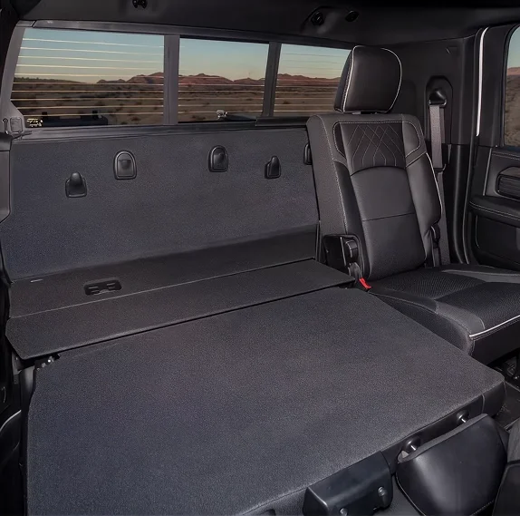 RAM 2500 rear bench folded fully flat creating a long carpeted load floor