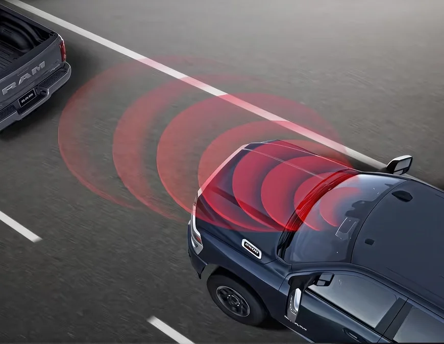 Illustration of a RAM 2500 sending red radar waves toward a car ahead in the same lane