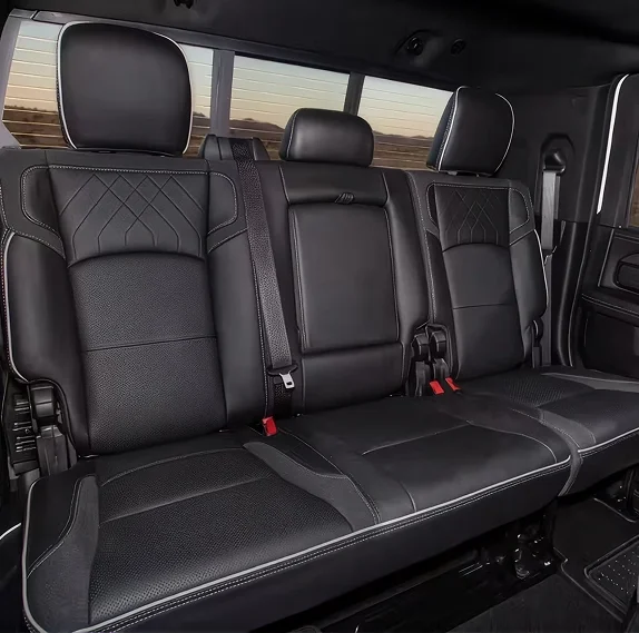RAM 2500 rear bench seat upright with three headrests and a desert view through the windows