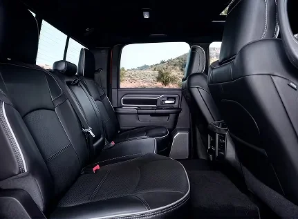 RAM 2500 front and rear seats trimmed in black leather with a view through the side windows