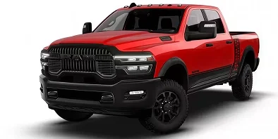 Red RAM 2500 Power Wagon 4x4 crew cab with black grille and wheels, front three-quarter studio view