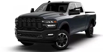 Dark navy RAM 2500 Warlock 4x4 with blacked-out trim, front three-quarter studio view