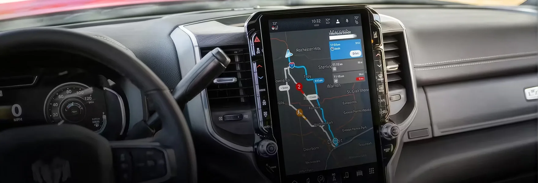RAM 3500 dashboard with the tall vertical Uconnect touchscreen showing a navigation map