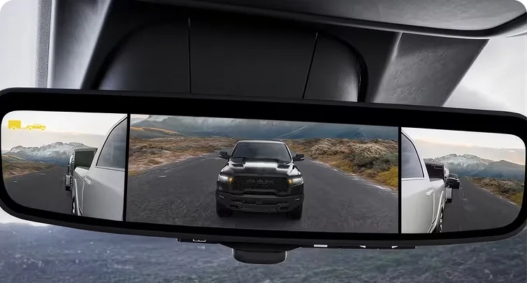 RAM digital rearview mirror split into three camera panels showing the road and both trailer sides