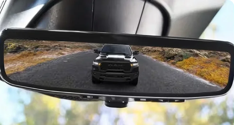 RAM digital rearview mirror showing a single wide camera view of the road behind the trailer