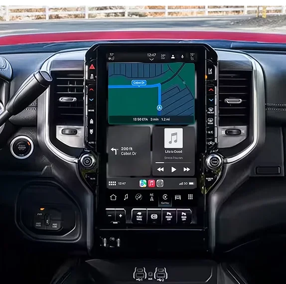 RAM vertical touchscreen running Apple CarPlay with a map and a music player on screen