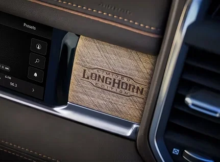 Limited Longhorn Edition wood-inlay dash panel above the infotainment presets screen