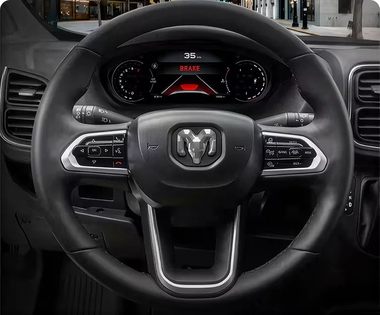 RAM steering wheel and instrument cluster showing a red brake warning alert