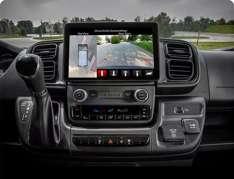 RAM touchscreen showing a 360-degree surround camera view around the van