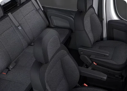 RAM ProMaster crew van cloth front bucket seats viewed from the rear cargo area