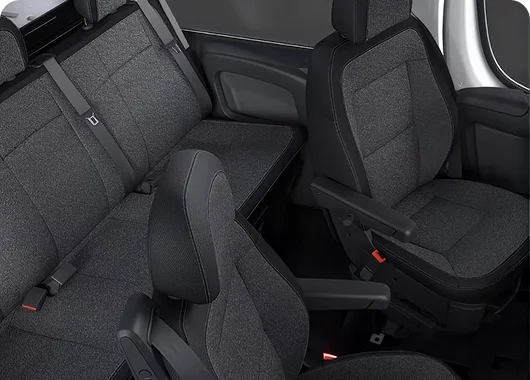 RAM ProMaster crew van cloth front swivel bucket seats viewed from the rear cargo area
