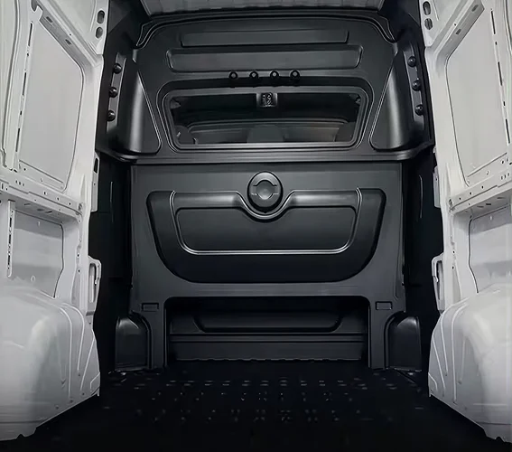Rear cargo view of a RAM ProMaster showing the partition wall behind the cab