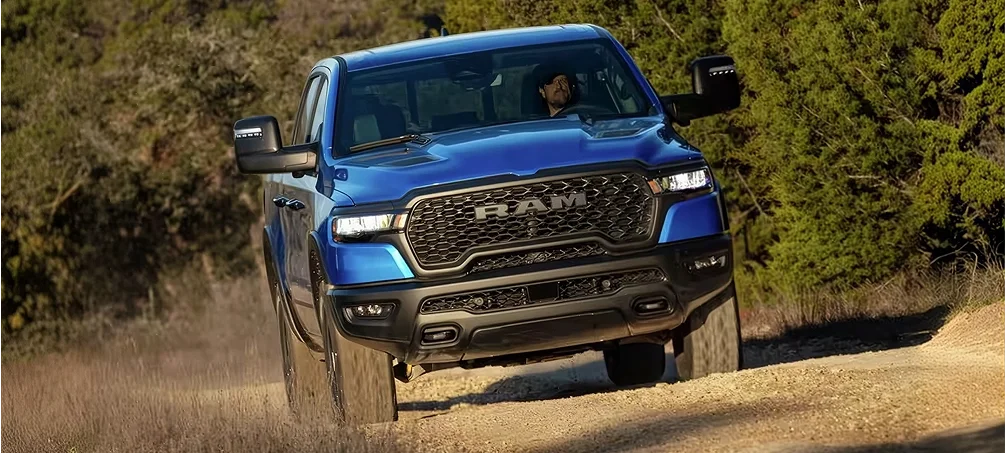 RAM 2500 parked on a job site with materials in the bed
